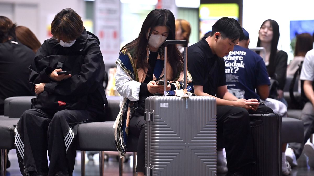 Japan typhoon causes travel chaos with 500 flights cancelled and tourist attractions closed
